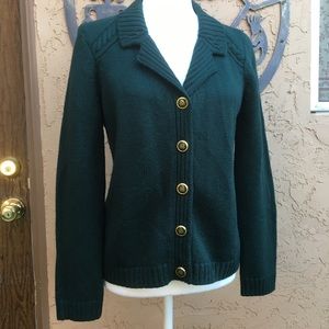 Emerald green cardigan.